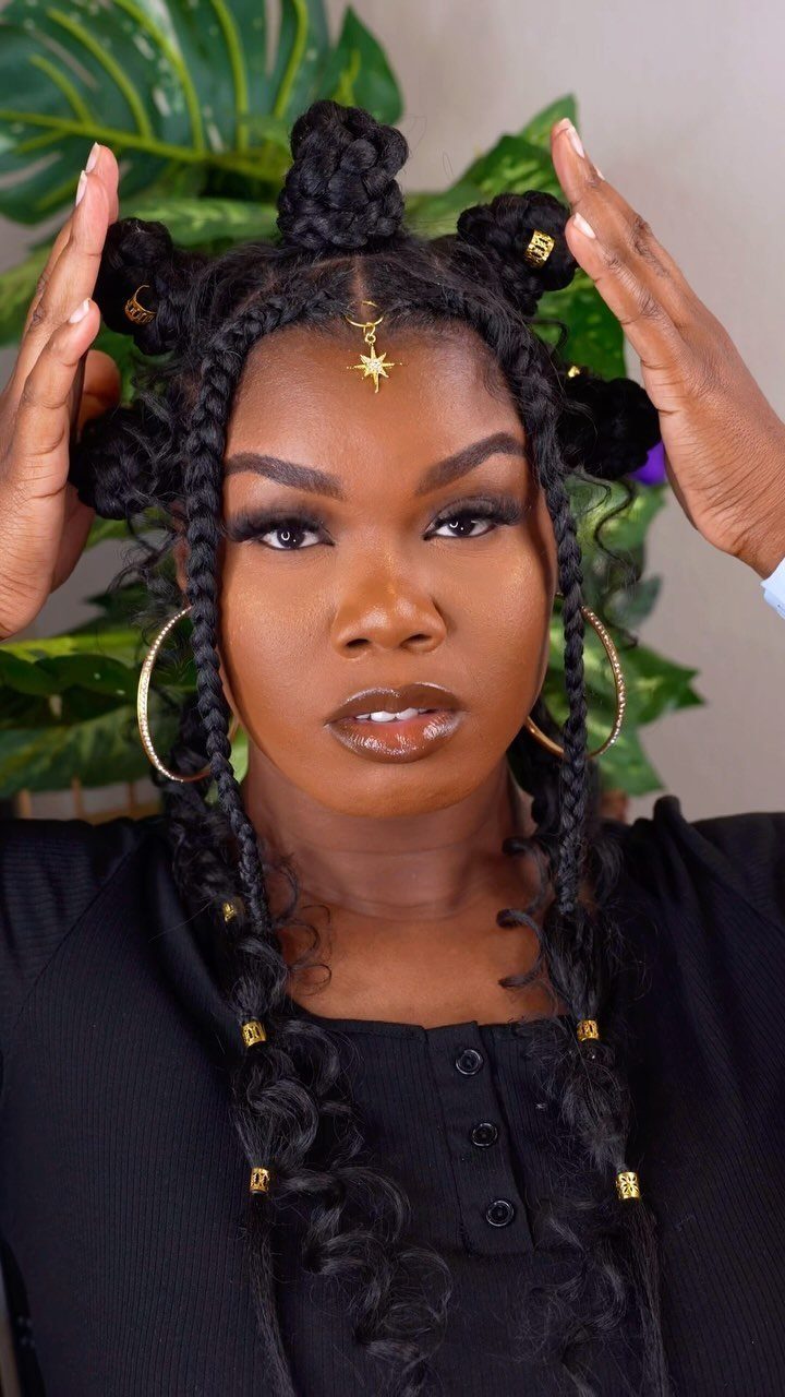 12 Braids Hairstyles: 16 Ideas From Box Braids to Cornrows 4 Woman with Bantu knots and long braids decorated with gold beads and jewelry.