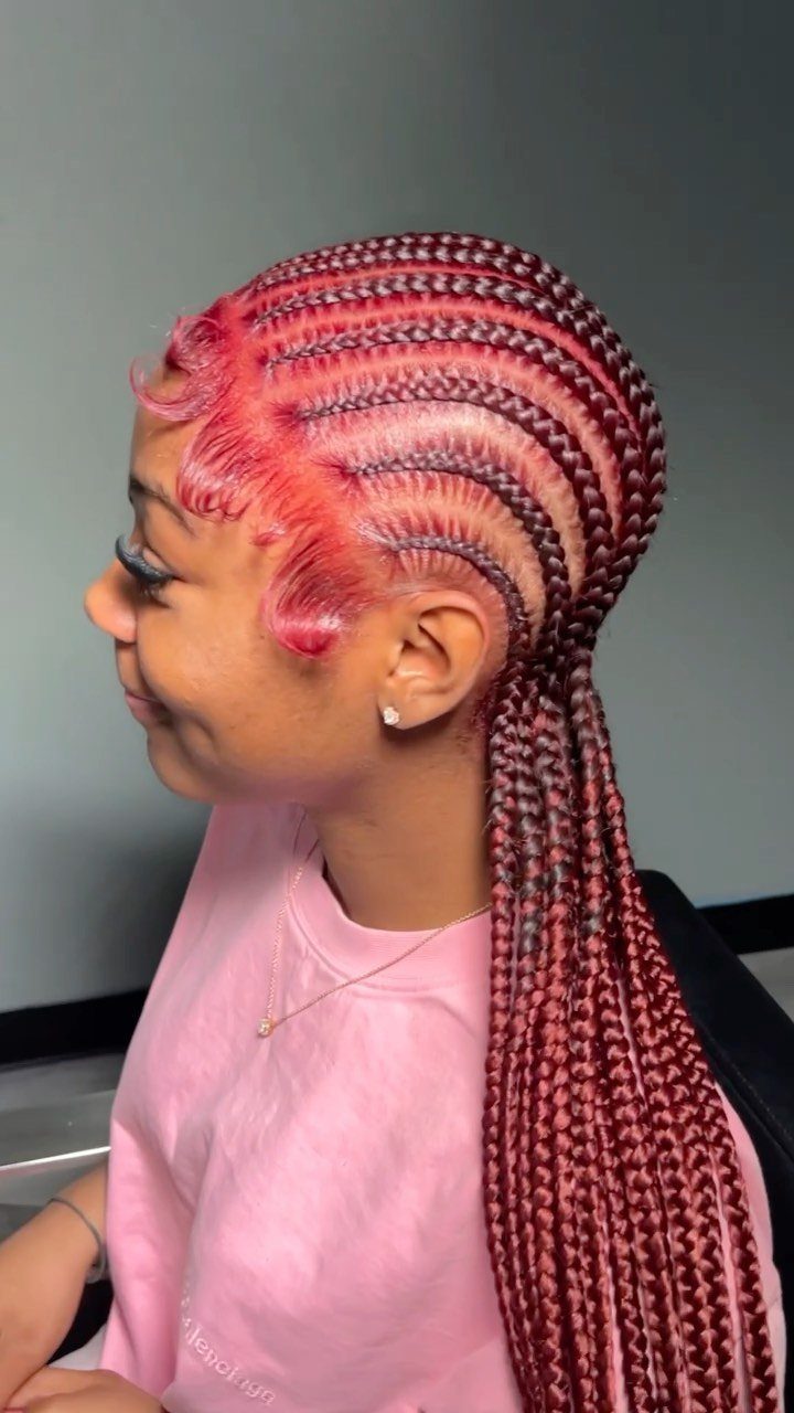 12 Braids Hairstyles: 16 Ideas From Box Braids to Cornrows 11 Woman with red and burgundy feed-in braids styled into a long ponytail.