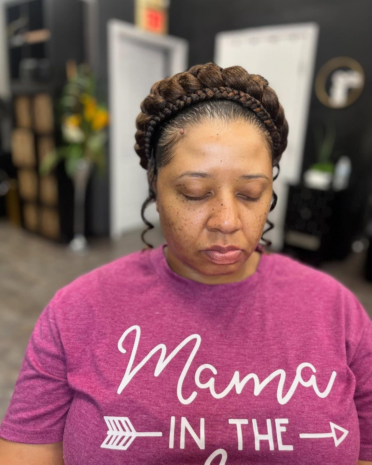 12 Braids Hairstyles: 16 Ideas From Box Braids to Cornrows 12 Woman with a thick brown halo braid circling her head like a crown.
