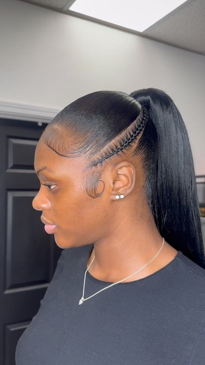 12 Braids Hairstyles: 16 Ideas From Box Braids to Cornrows 14 Woman with a high ponytail featuring a side cornrow braid and straight hair.