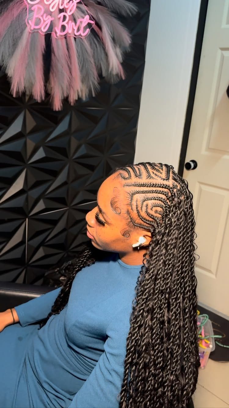 16 Big Cornrow Hairstyles for Bold, Standout Looks 4 Woman with Fulani braids featuring curved cornrows and long twisted black extensions.