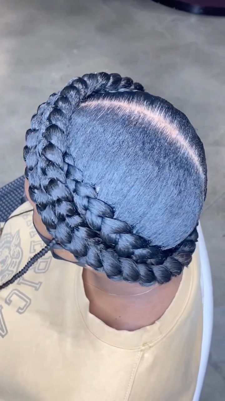 31 Black Hair Natural Hairstyles for Every Length 13 Halo braid hairstyle on black hair, viewed from above, creating a crown effect.