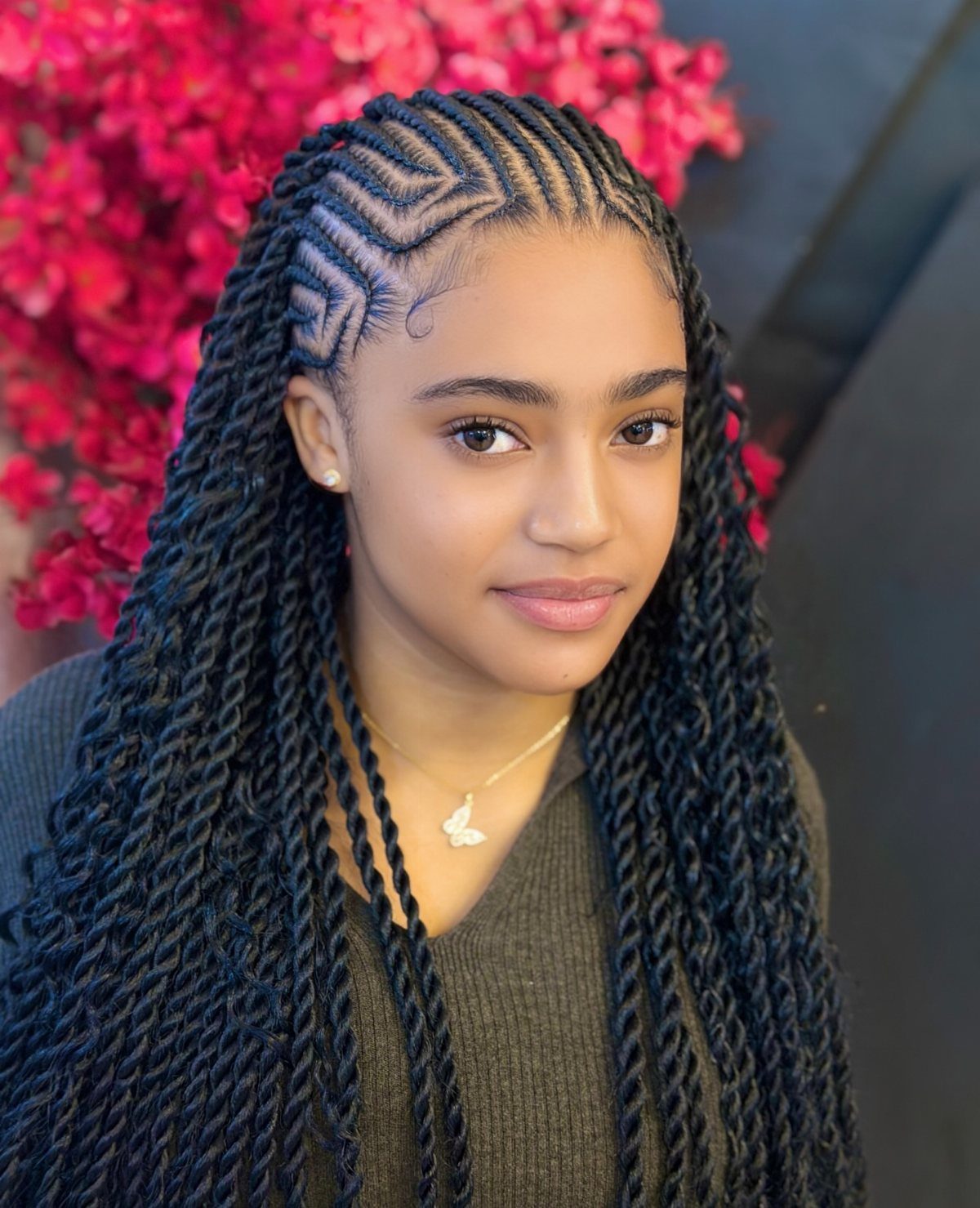 31 Black Hair Natural Hairstyles for Every Length 4 Woman with wavy cornrows on top and long black twisted braids.