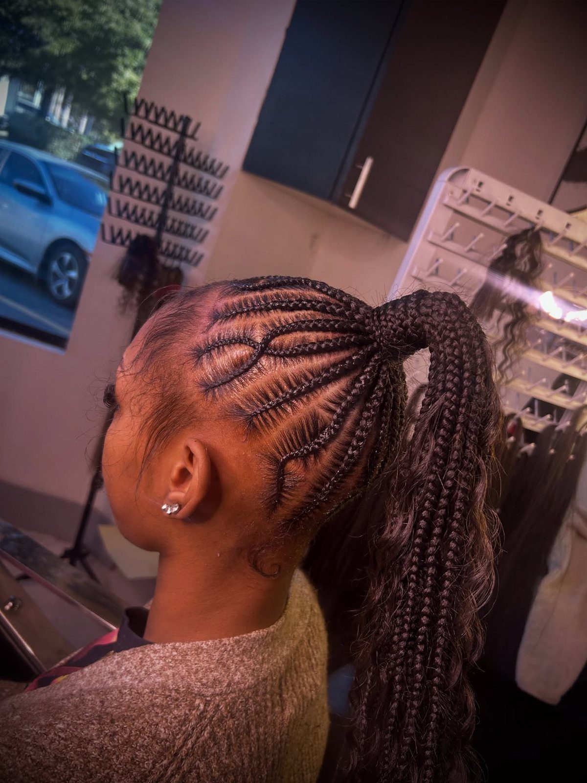 15 Braid Hairstyles for Thick Hair, From Bubble to Boho 1 High braided ponytail with intricate cornrow patterns on the scalp and long braids.