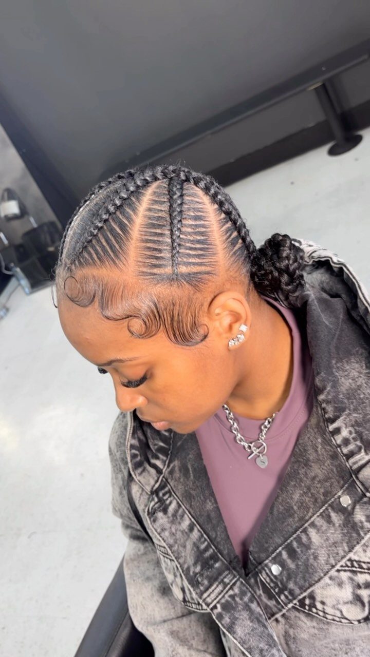 16 Braids Going Back with Curls: Styles to Try 16 Woman with cornrows braided back and curly hair gathered at the nape.