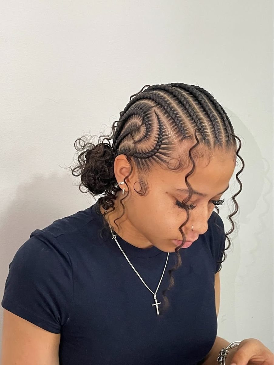 Braids in the Front Tracks in the Back: 5 Ideas 5 Woman with cornrow braids in front and a curly bun in back