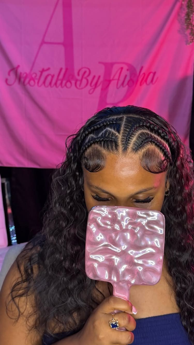 Braids in the Front Tracks in the Back: 5 Ideas 4 Woman with front braids and wavy hair holding a pink mirror