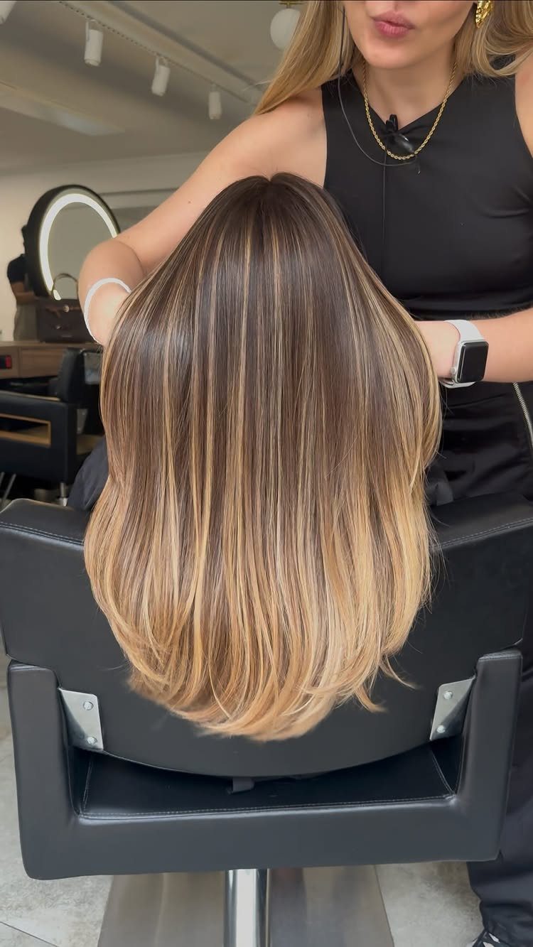 Caramel Mousse Hair Ideas: 5 Looks from Balayage to Highlights 3 Long straight hair with caramel mousse ombre highlights in a professional salon