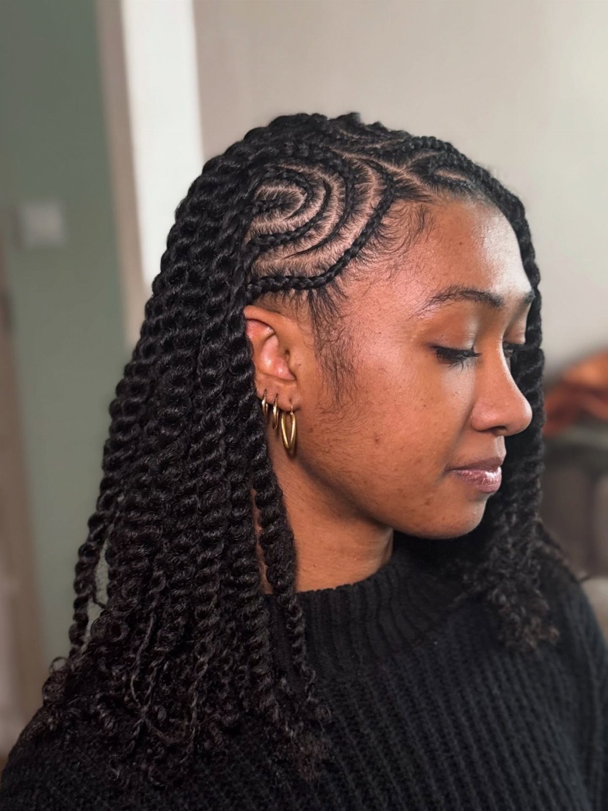 Curly Hair Design: 10 Ideas for Every Length and Texture 4 Woman with dark hair in side-part twists and a decorative scalp braid pattern.