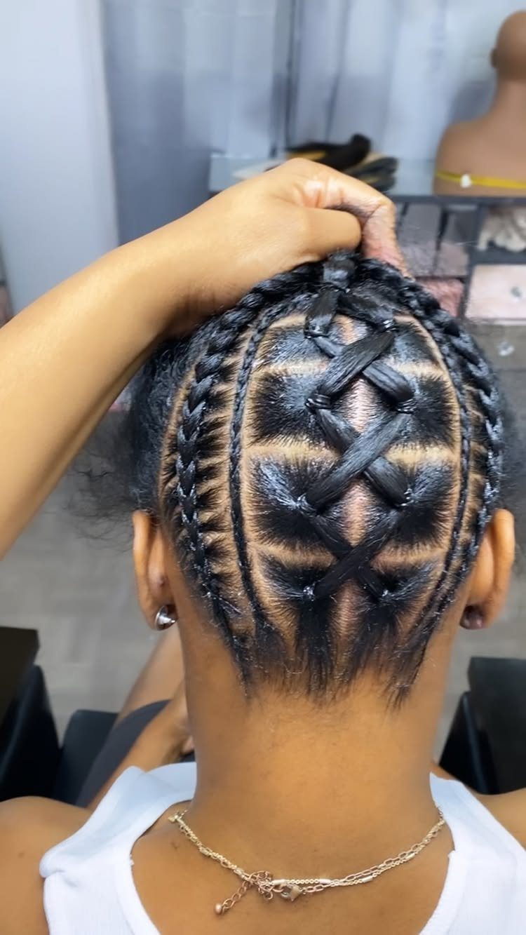 9 Cute Hair Styles for Church, From Buns to Box Braids 9 Intricate black cornrow braids with a criss-cross pattern on the back of head.
