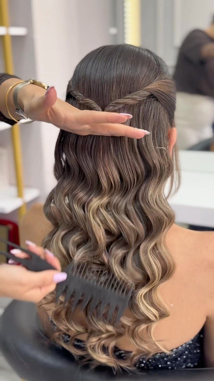 16 Cute Hairstyles for a Birthday Party, Waves to Braids 5 Long wavy brown and blonde hair with a twisted detail at the back.