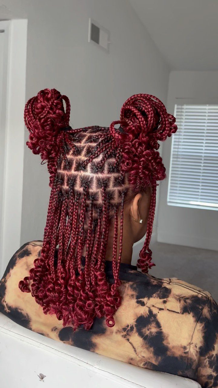 Cute Hairstyles for Hot Days: 11 Easy Ideas to Try 5 Red braided hair styled into two space buns and long hanging braids.