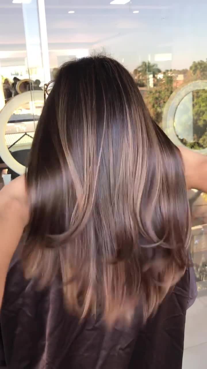 16 Dark Brunette Hair Color Ideas for Every Skin Tone 8 Long straight hair with a blend of dark brown and auburn chestnut tones.