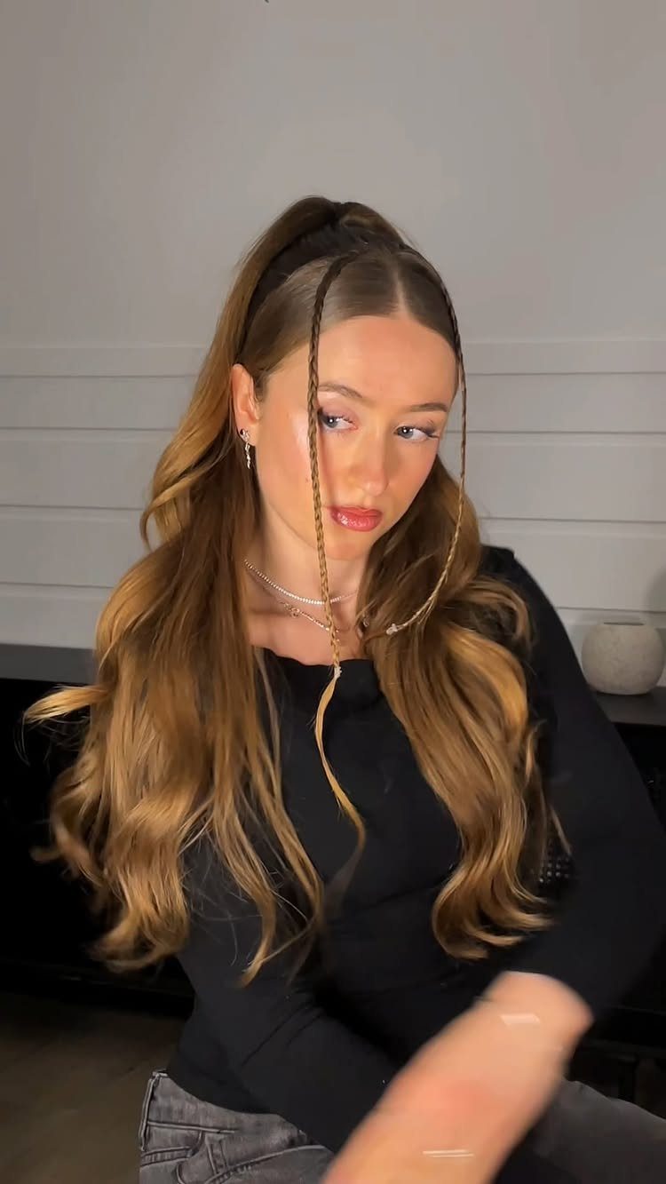18 Easy Hairstyles for Medium Hair You Can Do Fast 15 Woman with honey-blonde medium hair in a high ponytail and face-framing braids.