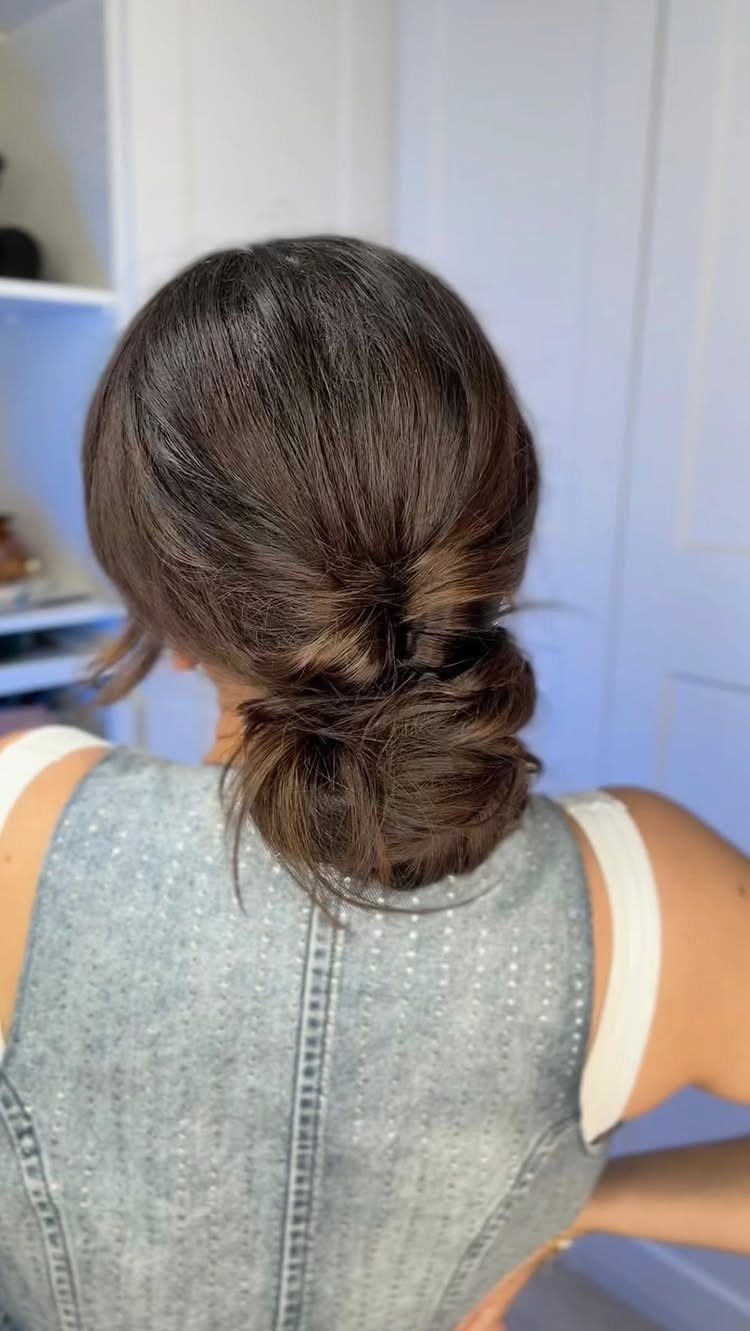 18 Easy Hairstyles for Medium Hair You Can Do Fast 14 Medium-length brown hair styled in a loose low bun from the back view