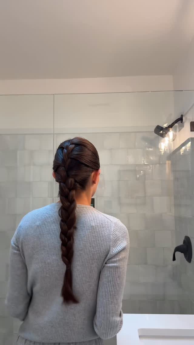 Easy One Braid Styles: 5 Ideas for Every Hair Type 1 Long brown French braid on a person wearing a grey ribbed sweater.
