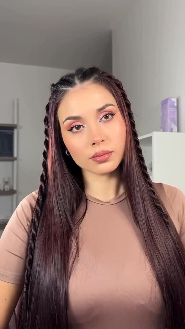 Fall Hair Dos with 15 Ideas from Burnt Copper to Claw Clips 6 Woman with long dark hair and two thin braids framing her face.