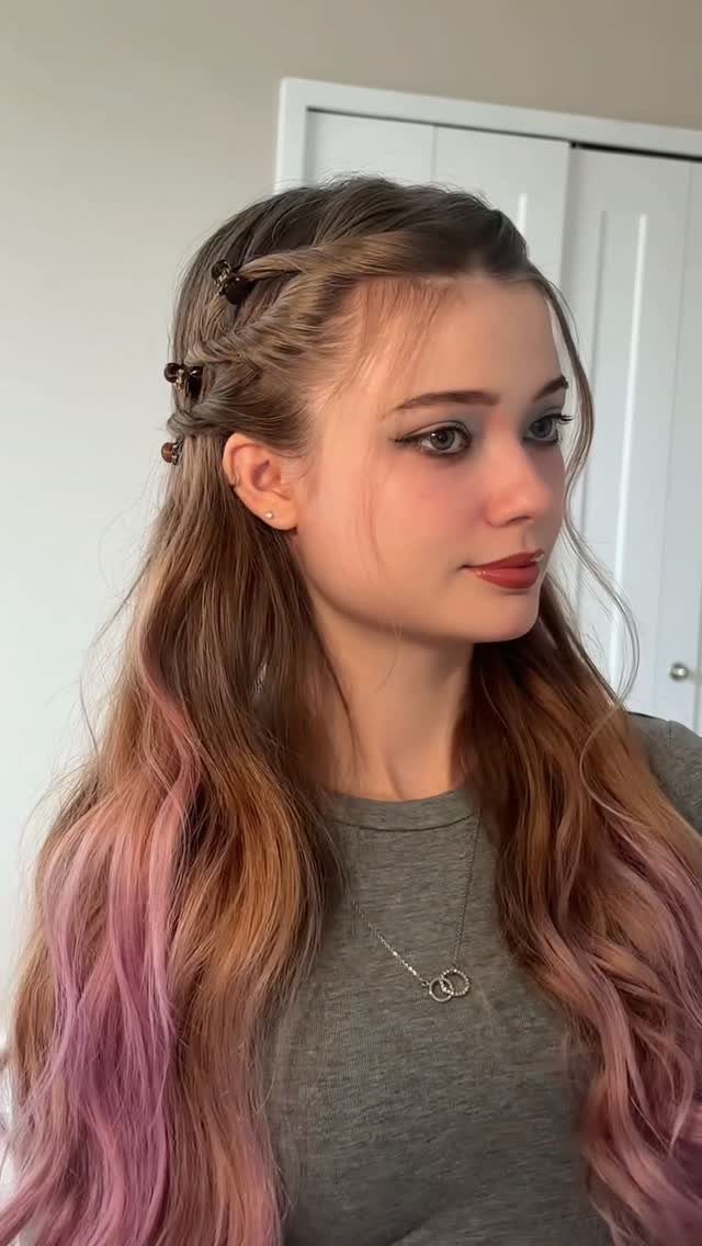Fall Hair Dos with 15 Ideas from Burnt Copper to Claw Clips 12 Woman with pink ombre hair using mini claw clips to style her hair.