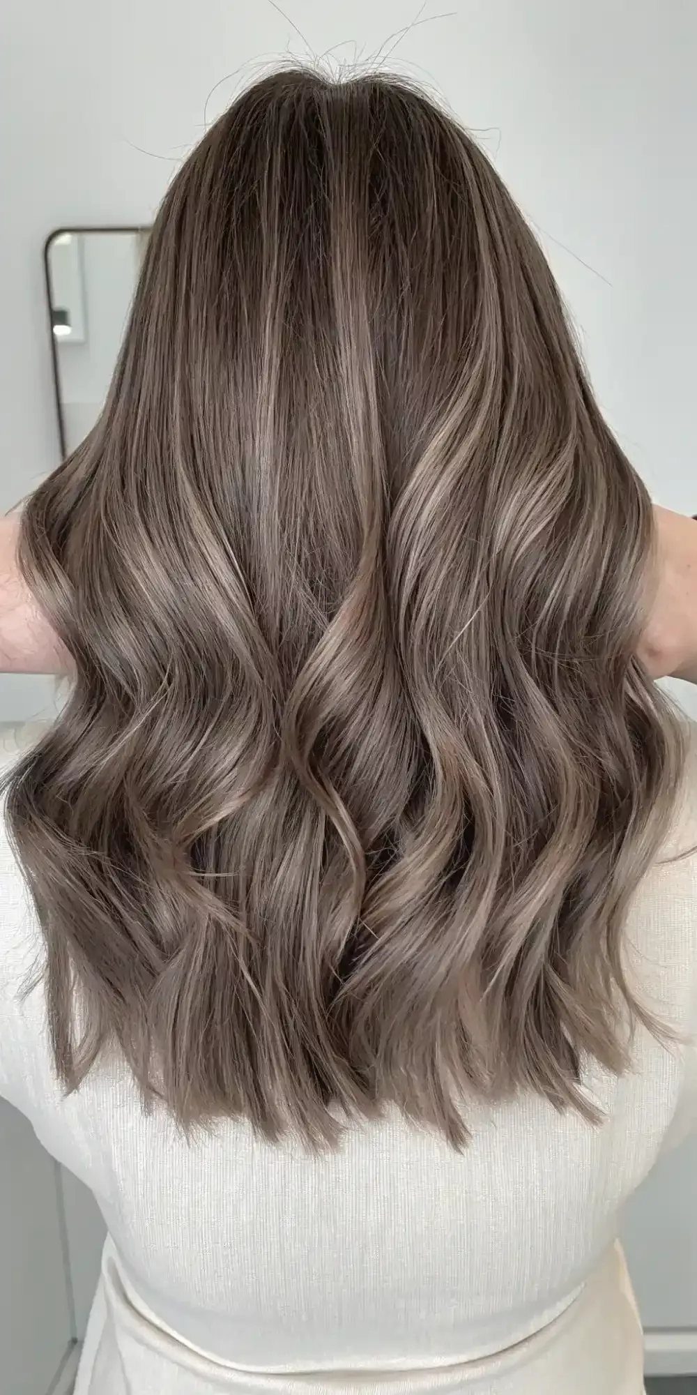 Hair Colour Ideas Brown: 13 Shades From Chestnut to Mahogany 12 Long wavy hair with mushroom beige tones and chocolate brown highlights from behind.