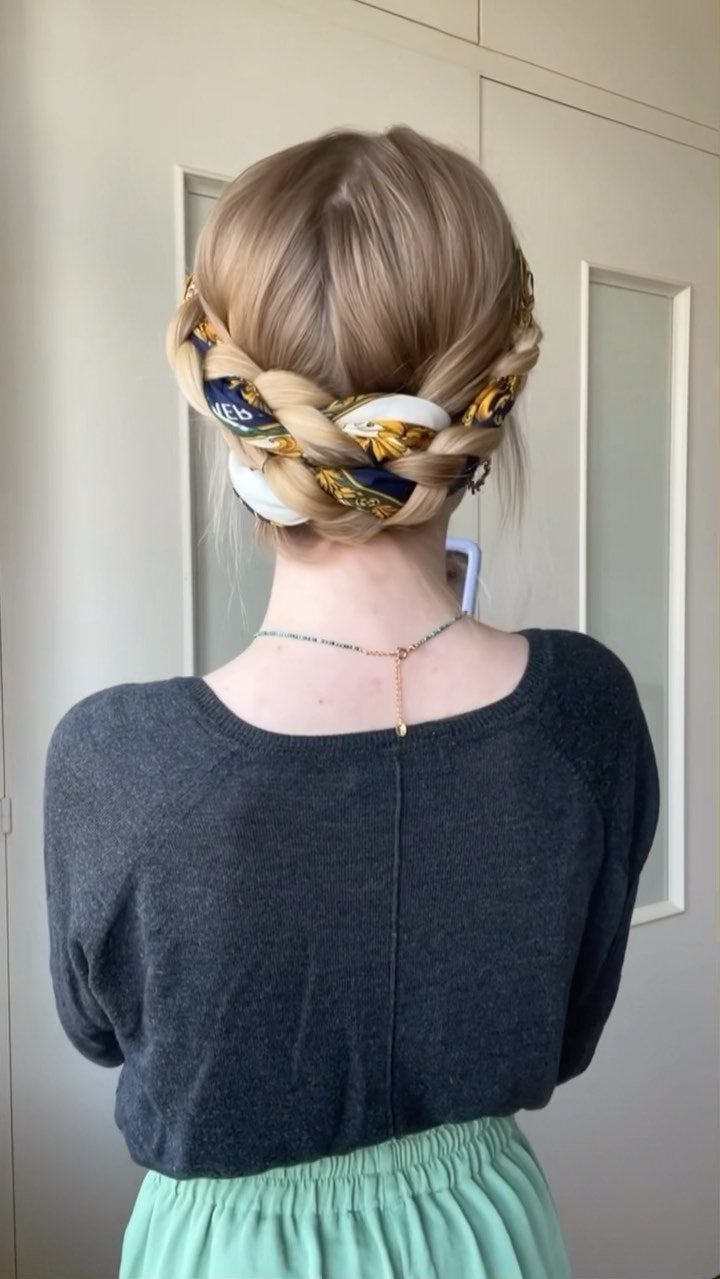 15 Ways to Pick a Hairstyle for Sweater Weather 13 Blonde braided bun wrapped in a patterned silk scarf, worn with grey sweater.