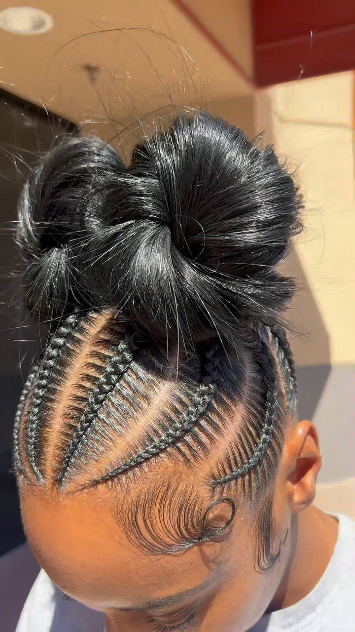 17 Hairstyles for Football Games: Braids, Buns & Ponytails 11 Black hair styled in cornrow braids and a high voluminous bun.
