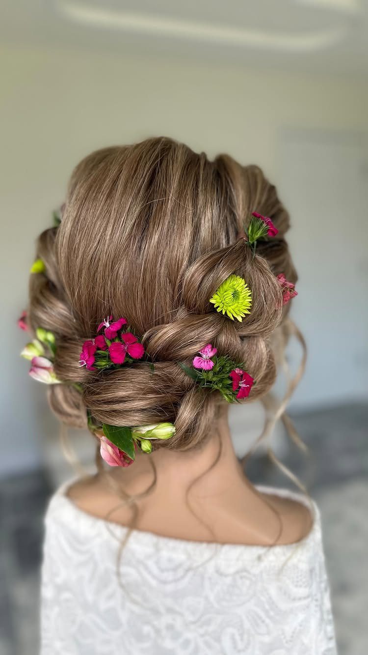 Healthy Hair Styles: 17 Protective Ideas for Natural Hair 7 Braided crown updo with pink and yellow flowers in light brown hair.