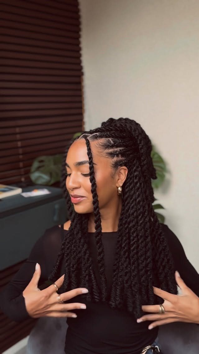 Healthy Hair Styles: 17 Protective Ideas for Natural Hair 16 Woman with long black twisted braids styled in a half-up half-down look.