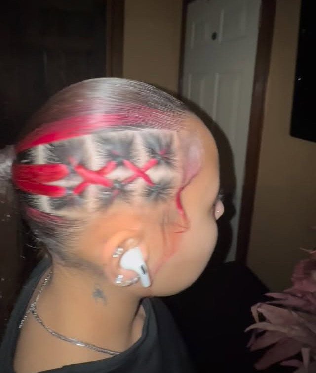 10 Little Rubber Bands for Hairstyles Kids Love 10 Person with silver and red hair styled with small red rubber bands.