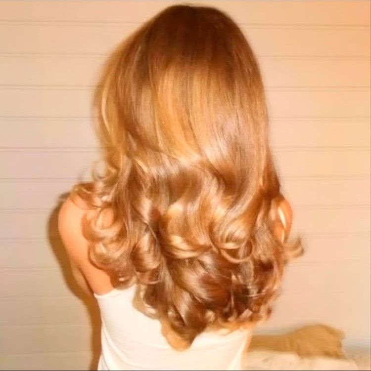 20 Long Hair Hairstyles for Work, From Buns to Braids 13 Long blonde hair styled in a voluminous blowout with large bouncy curls