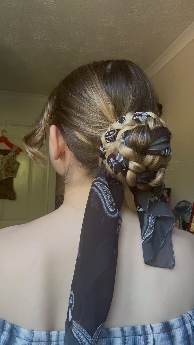 20 Long Hair Hairstyles for Work, From Buns to Braids 11 Braided bun with a black and white patterned scarf wrapped around it.