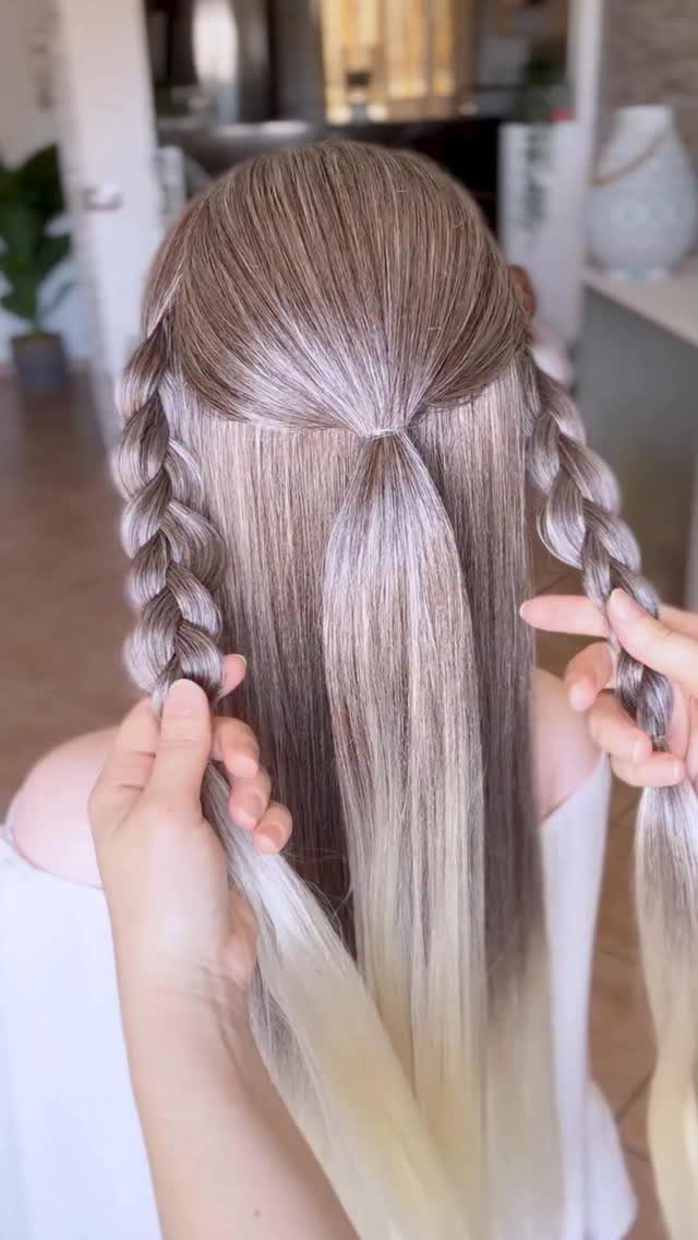 20 Long Hair Hairstyles for Work, From Buns to Braids 5 Long ash-blonde hair styled with two side braids and a straight center section.