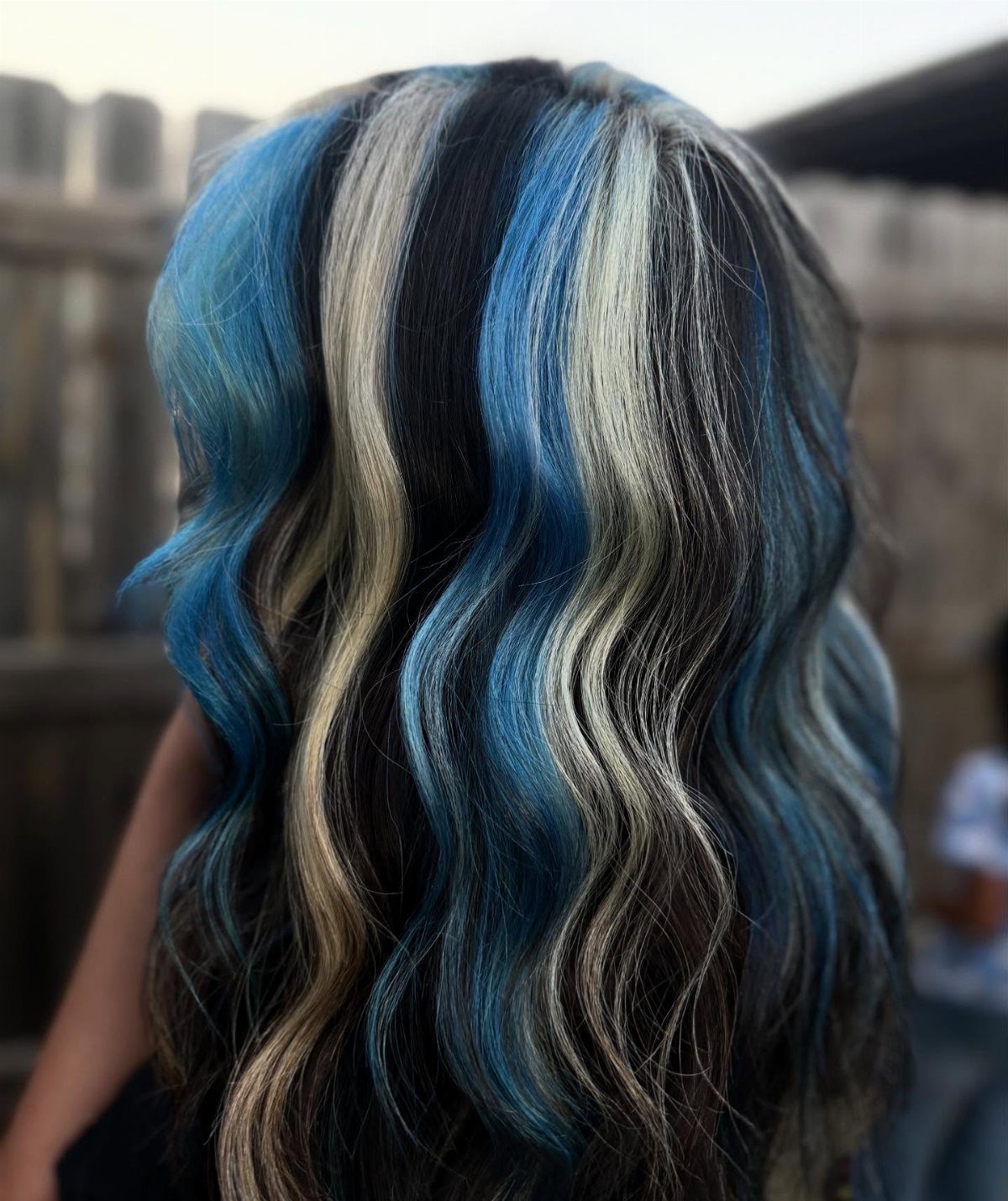 Neapolitan Hair Blue: 5 Ideas for Streaks and Peekaboos 1 Wavy hair with thick vertical streaks of blue, blonde, and black hair dye.