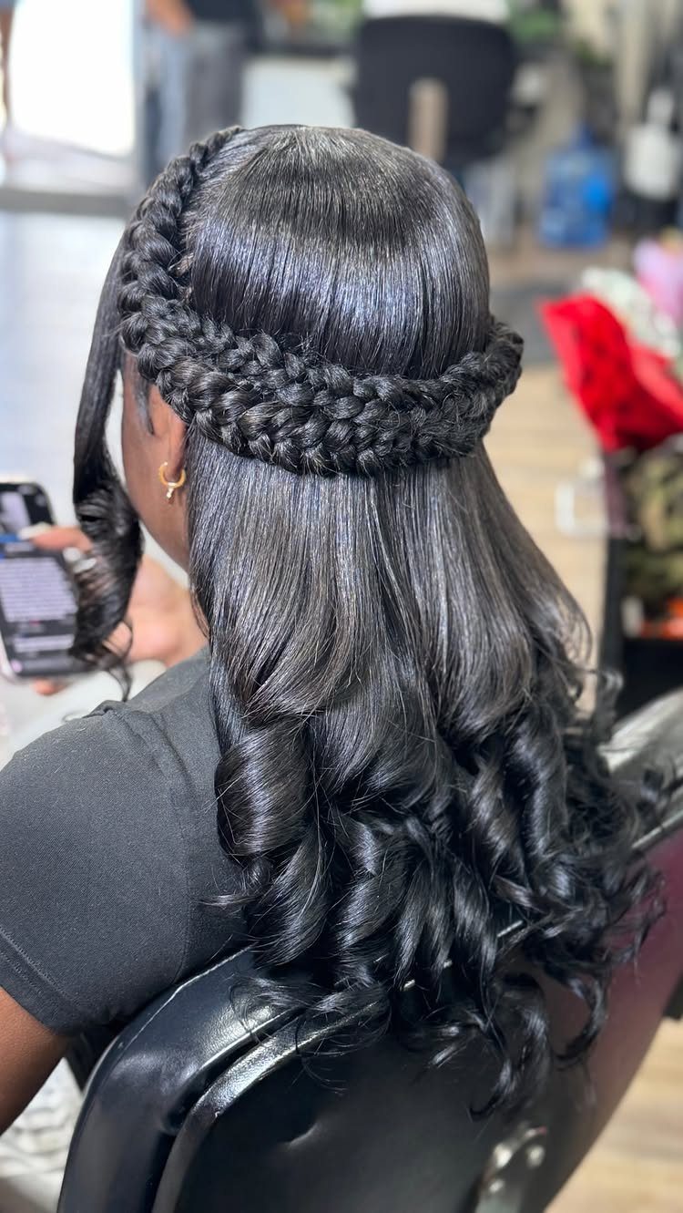 Quick Weave Styles with Braids: 18 Cornrow and Updo Ideas 13 Woman with long curly black hair and a thick braided crown wrap hairstyle.