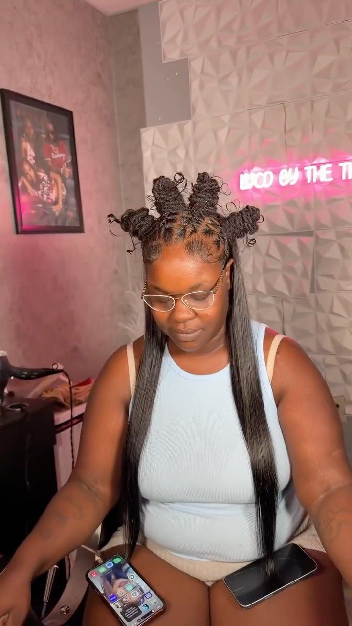 Quick Weave Styles with Braids: 18 Cornrow and Updo Ideas 14 Woman with long straight black hair and small braided knots on top.