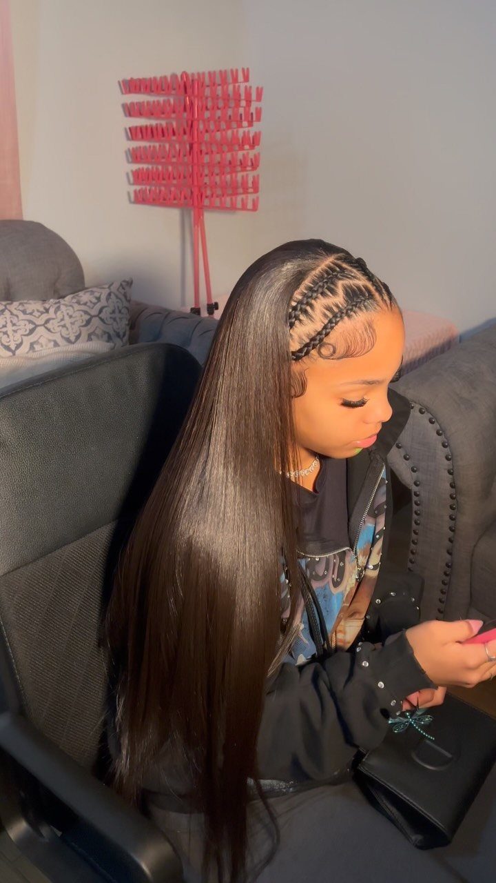 Quick Weave Styles with Braids: 18 Cornrow and Updo Ideas 10 Woman with long straight black hair and raised cornrows on the side.
